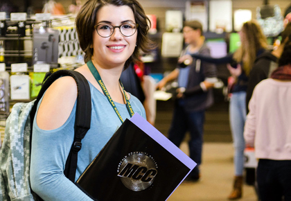 Early college students shop for books