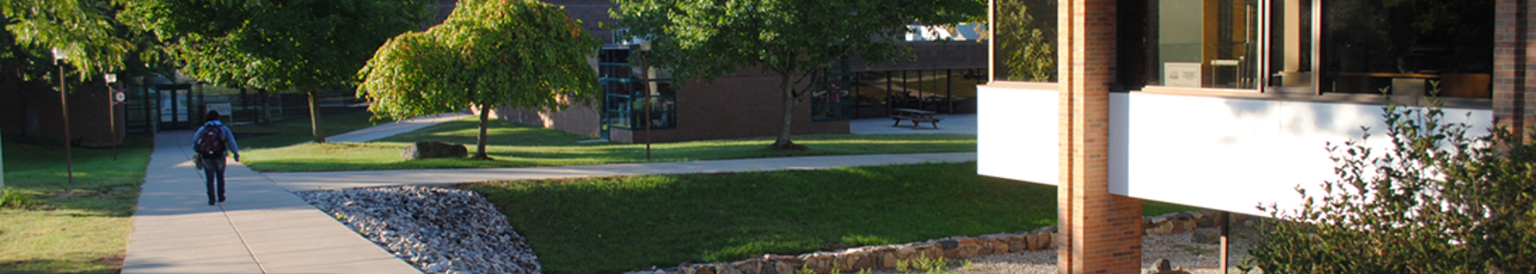 Student walking on MCC's Sidney campus