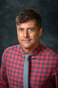 Headshot of Seth Thomas Sutton