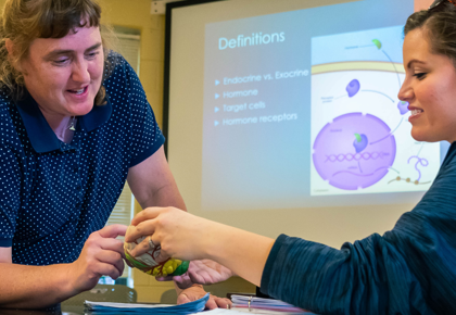 MCC Biology Instructor Michelle Gibson & female student