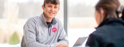 Male college student smiling