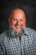 Headshot of Adam Yuhas