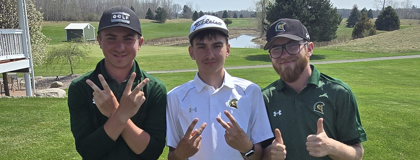 Ethan Johnson, Zach Johnson and Mason Blair (MCC Golfers) standing on golf course.