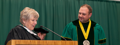 Karen Carbonelli speaking at the inauguration of President Bradley Barrick.
