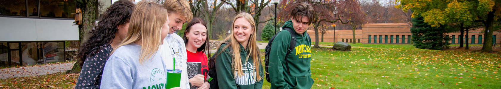 Photo of Students Walking Outside on Campus.