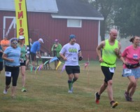 Runners at the 2024 Bramble Ramble race leaving the start line.