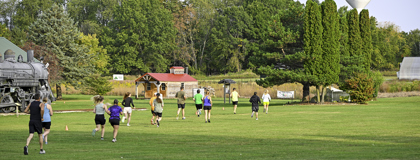 Runners taking off from the start line during the 10th annual Bramble Ramble 5K Trail Run/Walk and 7th Annual Mike Seaman Memorial 10K Run